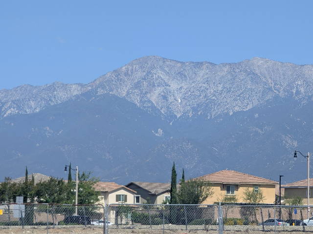 mountains in distance with suburban homes in foreground
