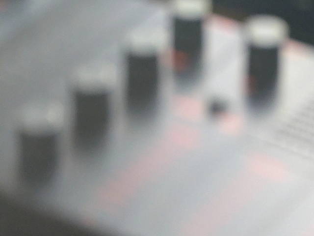 out of focus photo of a yamaha seqtrak groovebox