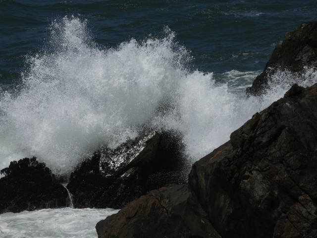 waves crashing on rocks