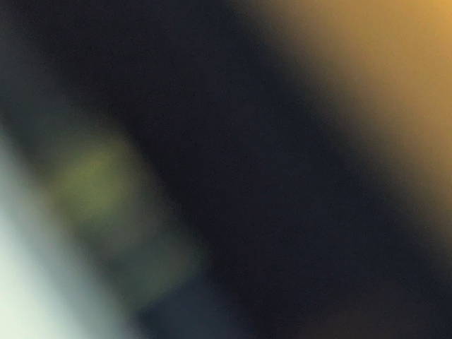 abstract blurred photo exploring brown, black, and white gradients