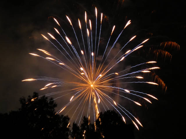 photo of a white fireworks bursting in air