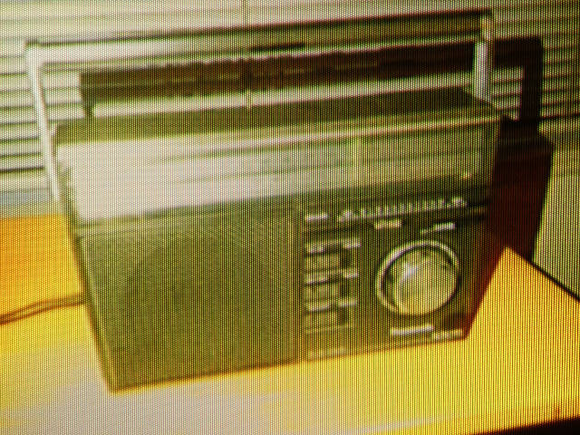 photo of a photo of a radio displayed on an old crt tv